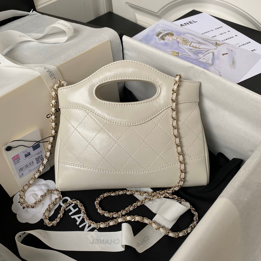 Chanel 25S Top Handle 20 cm in Cream White Lambskin Bag